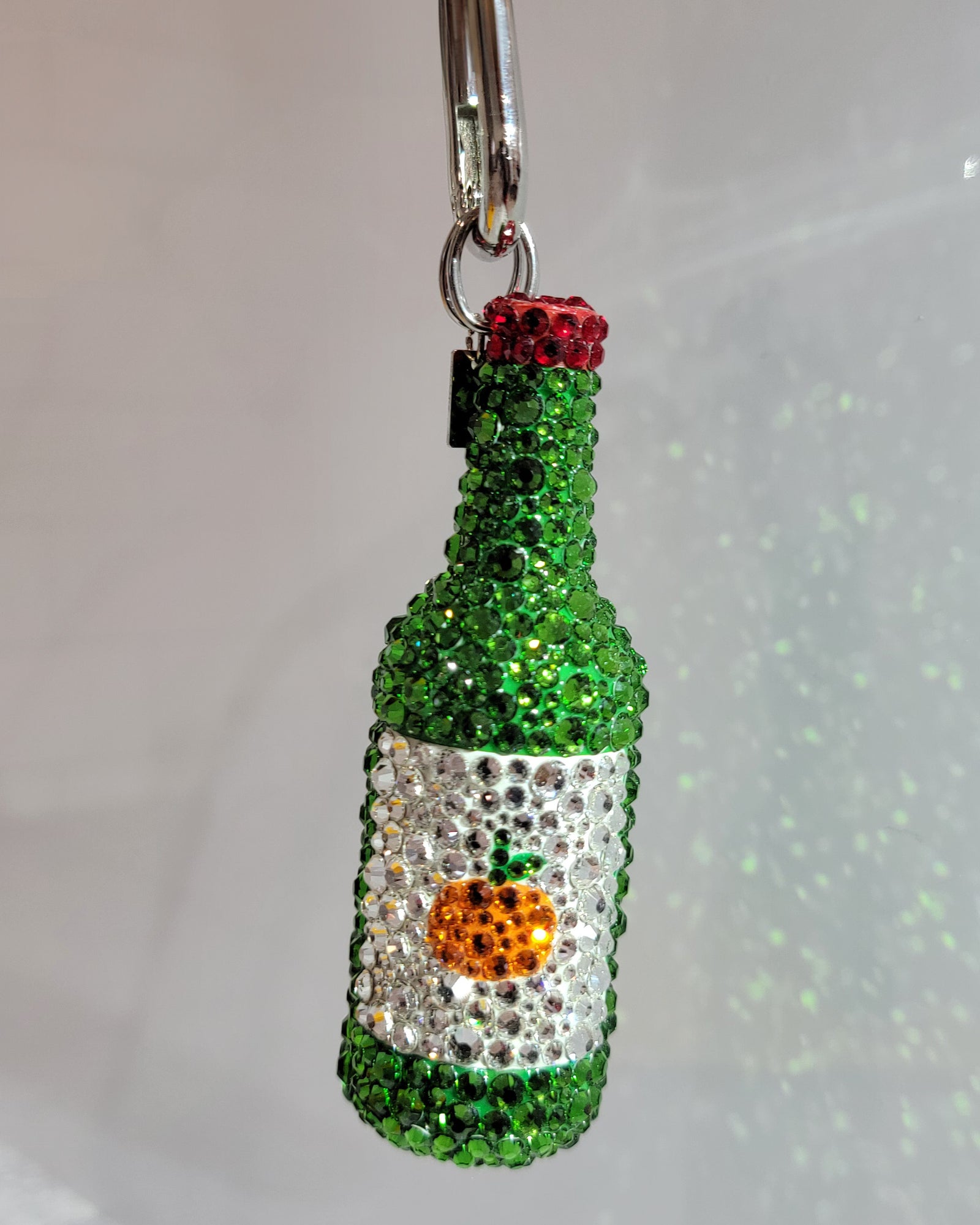 "Jeju Tangerine" Soju keychain (a green soju bottle with a white label and a small tangerine, featuring silver keychain hardware)