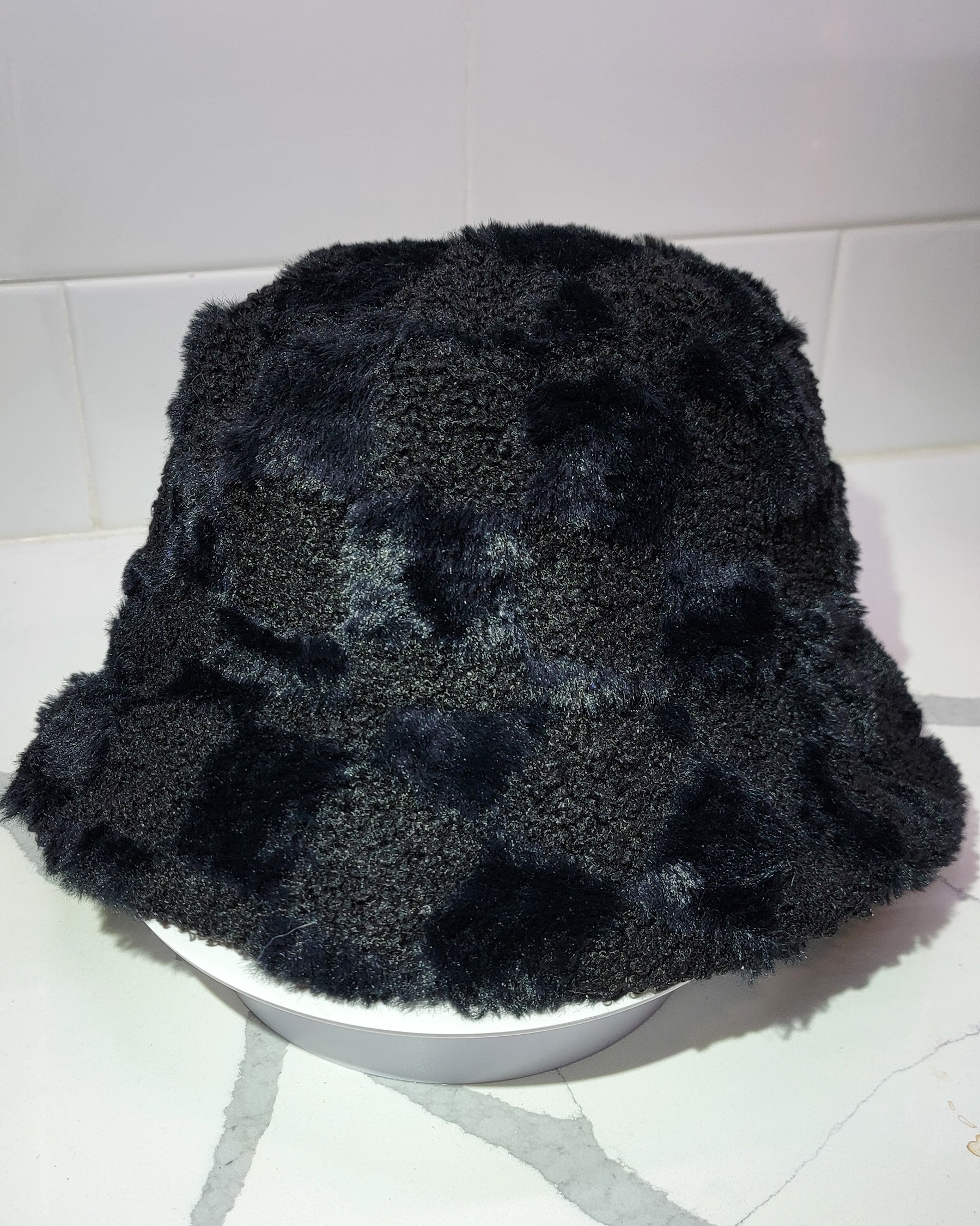 Back of Furry Checkered NYC Bucket Hat