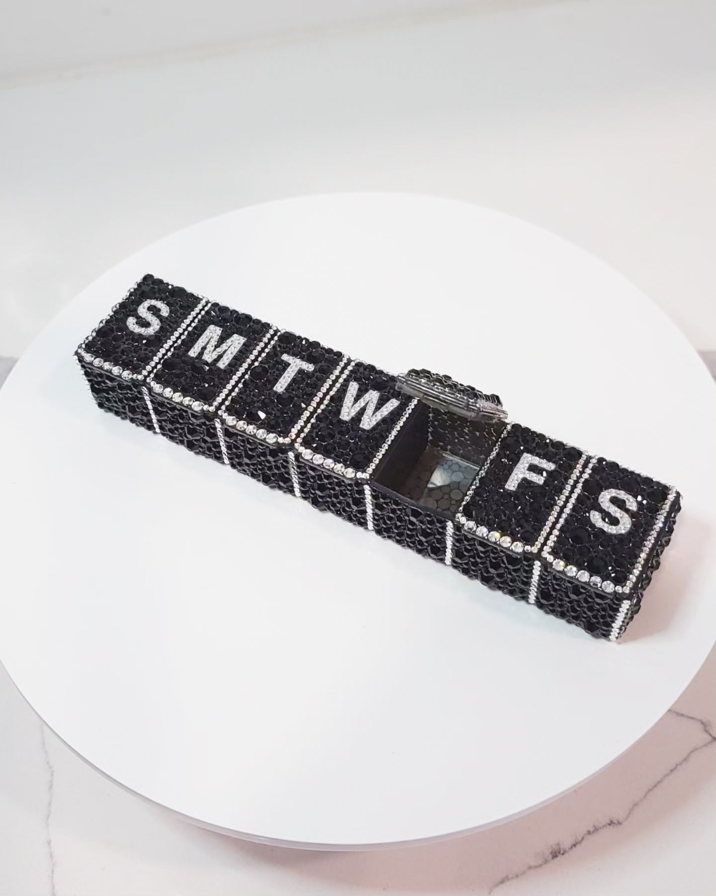 Side Shot of Crystallized Daily Pill Organizer, with one compartment open