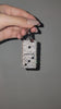 Video of Domino Bag Charm being rotated